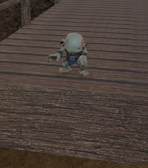 A small armoured creature on a wooden bridge between rock walls